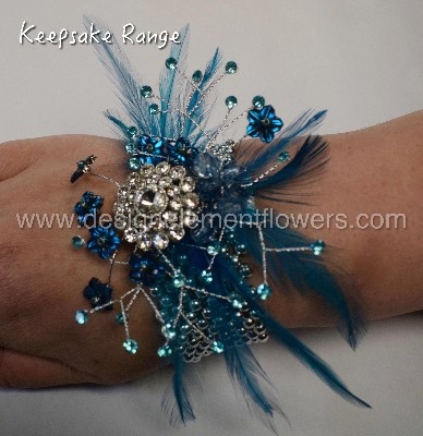 KEEPSAKE RANGE Wrist Corsage With Aquamarine Feathers,Diamantes and Flowers  also hand delivered in Irlam , Cadishead , salford, Manchester, Urmston, Flixton,Old Trafford , Peel Green