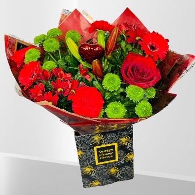 Valentines Ruby Red hand-tied hand delivered in Manchester , Salford , Eccles , Worsley , Peel Green , Monton, Trafford , Worsley 