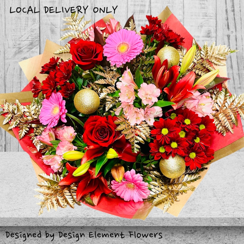 Christmas Festive Celebration Hand tied Bouquet Hand Delivered in Irlam , Cadishead , Eccles,Peel Green , Worsley , Swinton , Urmston 