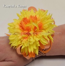 KEEPSAKE RANGE Silk Yellow and Orange Gerber Wrist Corsage  can be hand delivered in Manchester , Eccles , Worsley, Salford , Irlam , Cadishead , Urmston 